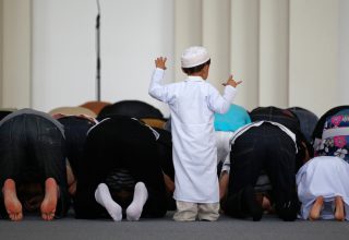 A-child-blocks-the-place-of-prostration