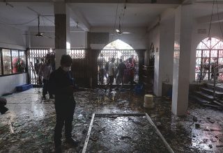 Shattered glasses are seen inside a mosque following a fire in the central district of Narayanganj, on September 5, 2020. - A suspected gas explosion tore through a Bangladesh mosque killing at least 12 people while dozens suffered life-threatening burns, police said on September 5. (Photo by Munir UZ ZAMAN / AFP)
